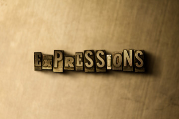 EXPRESSIONS - close-up of grungy vintage typeset word on metal backdrop. Royalty free stock illustration.  Can be used for online banner ads and direct mail.