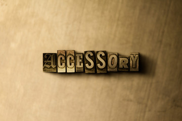 ACCESSORY - close-up of grungy vintage typeset word on metal backdrop. Royalty free stock illustration.  Can be used for online banner ads and direct mail.