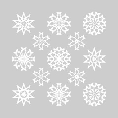 Snowflake set. Collection of different white snowflakes on grey background. Snowflakes for Christmas design. Hipster Style Design for Labels, Badges and Icons.