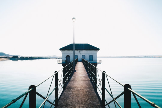A bridge to white building
