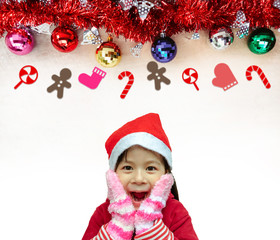 Adorable girl and red hat with decorations.Little girl in christmas hat for christmas concept.