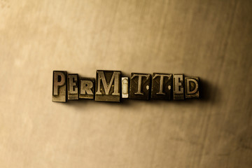 PERMITTED - close-up of grungy vintage typeset word on metal backdrop. Royalty free stock illustration.  Can be used for online banner ads and direct mail.