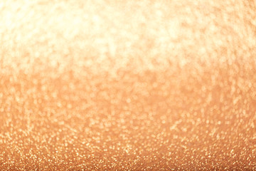 Defocused gold glitter background