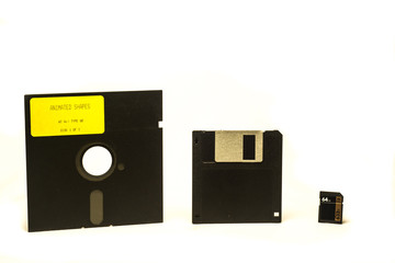 Old Floppy Disks isolated with SD card on white backgrounds