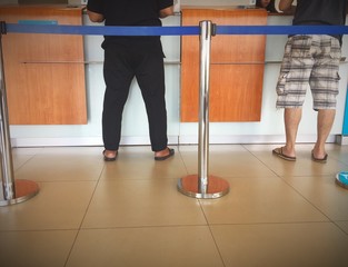 queuing and paying in the bank