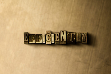 Naklejka premium EFFICIENTLY - close-up of grungy vintage typeset word on metal backdrop. Royalty free stock illustration. Can be used for online banner ads and direct mail.