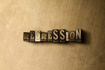 REGRESSION - close-up of grungy vintage typeset word on metal backdrop. Royalty free stock illustration.  Can be used for online banner ads and direct mail.