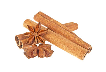 Cinnamon sticks and anise stars isolated on white background