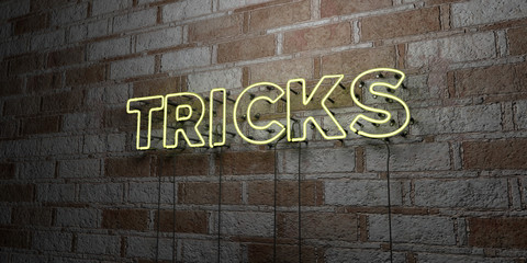 TRICKS - Glowing Neon Sign on stonework wall - 3D rendered royalty free stock illustration.  Can be used for online banner ads and direct mailers..
