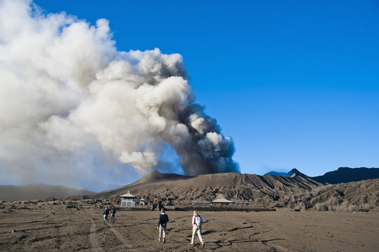 Tourists watching Mount Bromo volcanic eruption, East Java, Indonesia