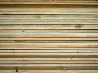 Picture of the wooden wall texture close up. Bright wooden planks pattern close up.