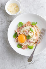 pasta carbonara with prosciutto,  parmesan cheese and eggs yolk
