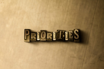 Obraz premium PRIORITIES - close-up of grungy vintage typeset word on metal backdrop. Royalty free stock illustration. Can be used for online banner ads and direct mail.