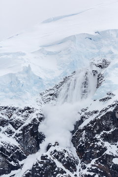 Ice cornice avalanche at Neko Harbor, western side of the Antarctic Peninsula, Antarctica