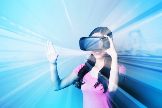 woman using VR headset glasses © ryanking999