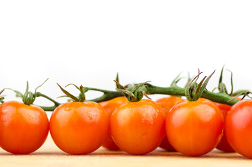 Fresh Olives And Cherry Tomatoes On Wooden Table With White Background Close Up