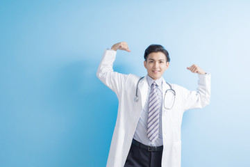 male doctor show strong arm