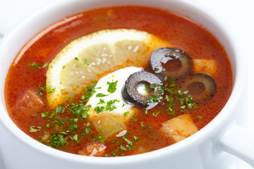 Solyanka - Russian traditional meat soup.