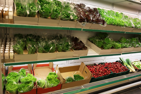 Fresh vegetables and greens in supermarket