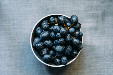 Dark grapes in plate, fresh grapes in the plate, Black Grape.