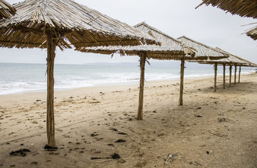 Beach umbrella made of straw. Crimean , winter 2014