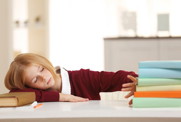 Schoolgirl tired of doing lessons at home