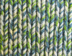 Knitted wool texture background.Winter clothes texture close up.Knitted woolen fabric texture.