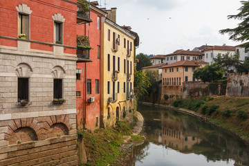 Canal and colorful facades of Vicenza, Italy