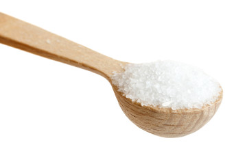 Fototapeta na wymiar Small wooden spoon of fine salt isolated on white.