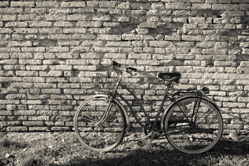 Fototapeta na wymiar old bicycle parked long an external wall in Burano island, Venice