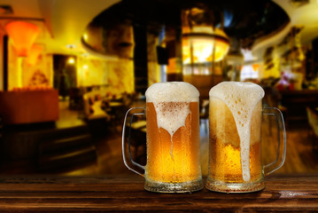cold light beer glass mug in a pub