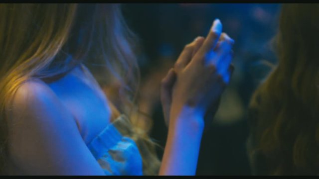 EXTREME CU Group of a attractive female models clapping hands during fashion show. Beautiful girls on a catwalk event. 4K UHD 60 FPS slow motion
