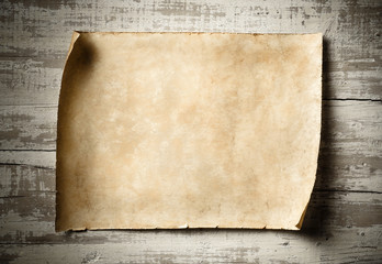 antique blank parchment on aged wall