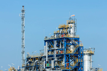 Fototapeta na wymiar Petrochemical plant, oil refinery factory with cloudy sky
