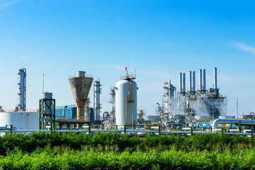 Petrochemical plant, oil refinery factory with cloudy sky