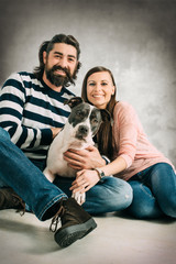 Young couple with their dog