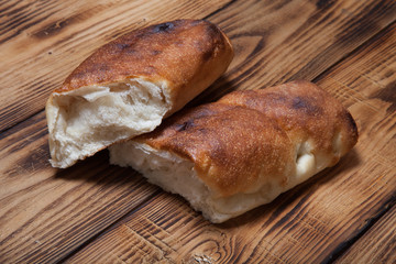 Georgian bread on a light wooden table or board