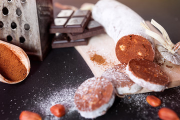 Chocolate sausage on chopping board