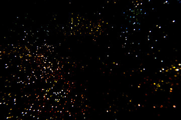 Glitter wonderful lights background.Abstract dark glitter lights