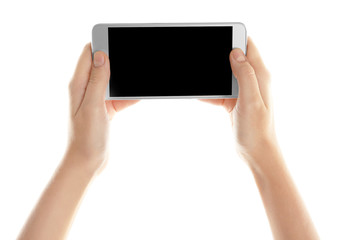 Hands holding cellphone on white background