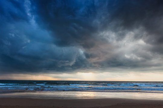 Fototapeta Gathering storm on beach
