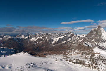 Obraz premium Matterhorn covered with clouds on a clear day after snow fall in autumn, Valais, Switzerland
