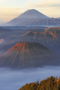 Sunrise over the smoking Gunung Bromo volcano, Bromo-Tengger-Semeru National Park, Java, Indonesia