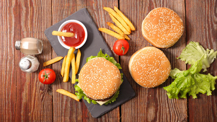 hamburger and french fries - obrazy, fototapety, plakaty