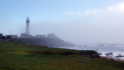 Fototapeta na wymiar PESCADERO, CALIFORNIA, UNITED STATES - OCT 6, 2014: The Pigeon Point Lighthouse along the Highway No. 1