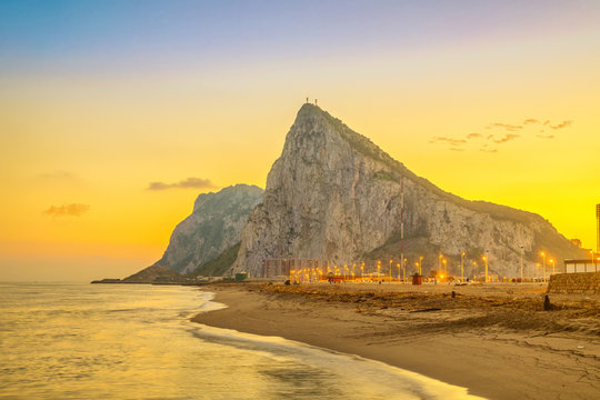 Fototapeta View on Gibraltar rock at sunset from beach in La Linea de la Concepcion, Andalusia, Spain