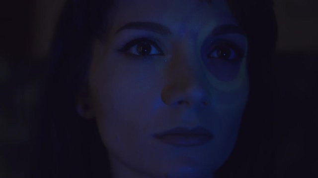 4k Abstract Shot of a Woman Face with Projector Reflection of Graphs