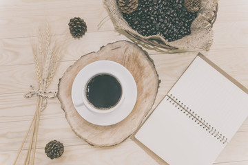 Coffee cup and coffee beans on a wooden table ,Top view point