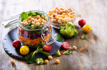 Healthy homemade chickpea and veggies salad, diet, vegetarian, vegan food, vitamin snack