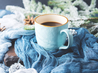 Obraz na płótnie Canvas Mug of coffee and milk on dark winter background. Top view horizontal